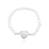 Pulsera de perlas con corazón de filigrana